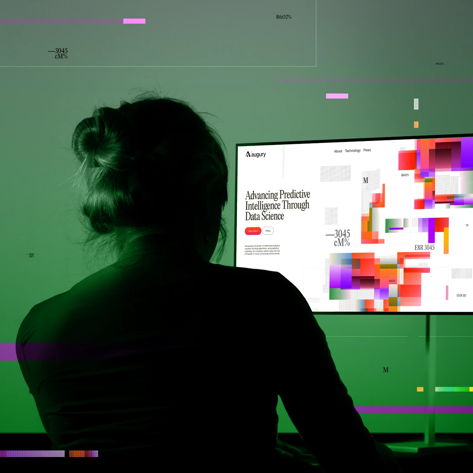 Woman at a monitor showing the Augury website, Advancing Predictive Intelligence Through Data Science