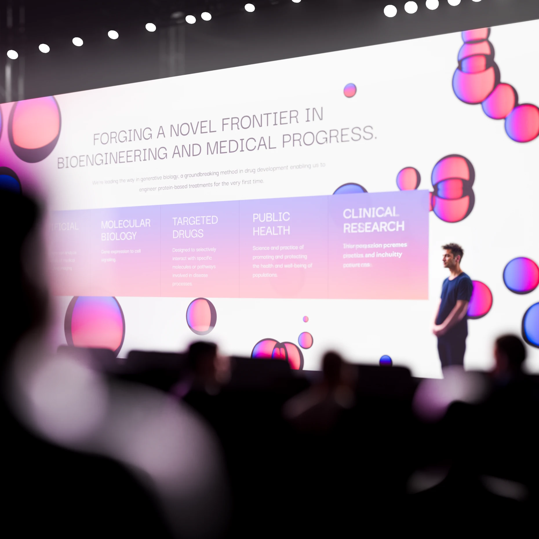 Speaker on stage before a Receur screen, Forging a Novel Frontier in Bioengineering and Medical Progress