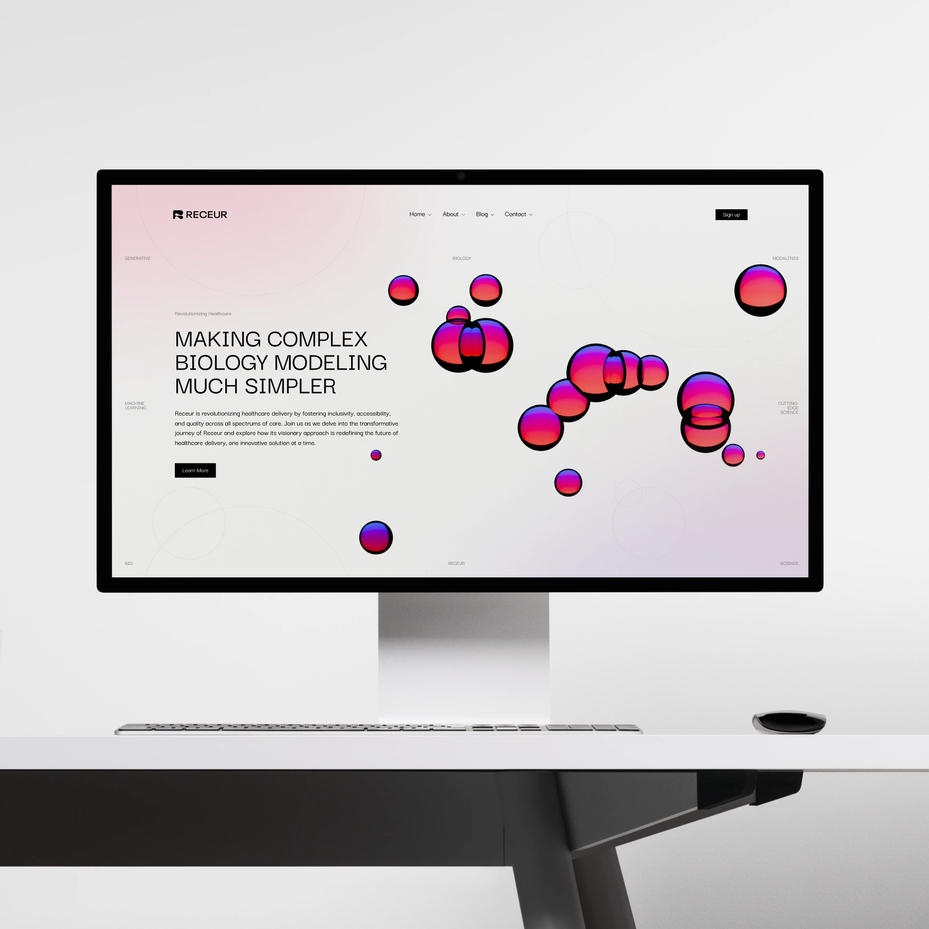 Monitor showing the Receur website, Making Complex Biology Modeling Much Simpler